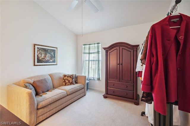 interior space featuring ceiling fan and vaulted ceiling