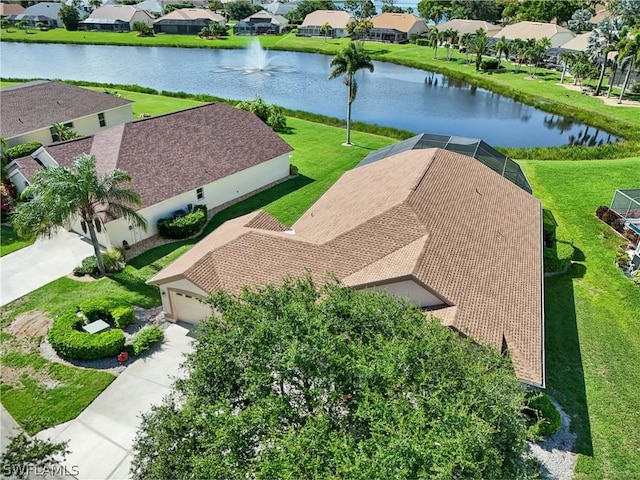 drone / aerial view with a water view