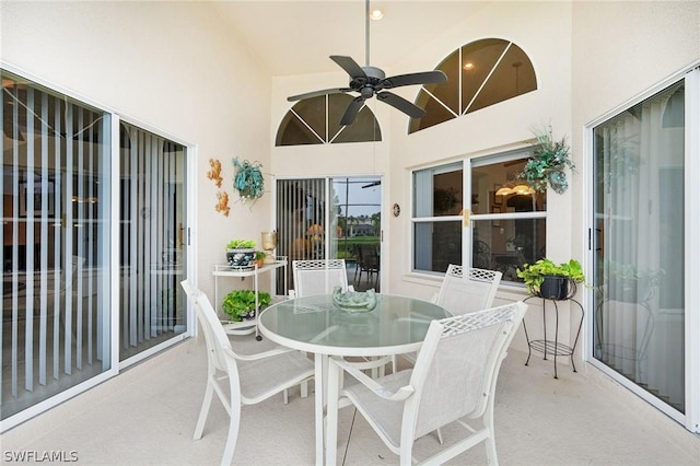 view of patio featuring ceiling fan