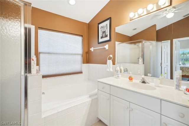 bathroom featuring vanity, vaulted ceiling, independent shower and bath, and ceiling fan