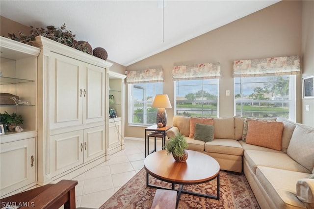 living room featuring light tile patterned flooring and lofted ceiling