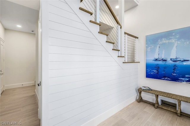 interior space featuring light wood-style floors and baseboards