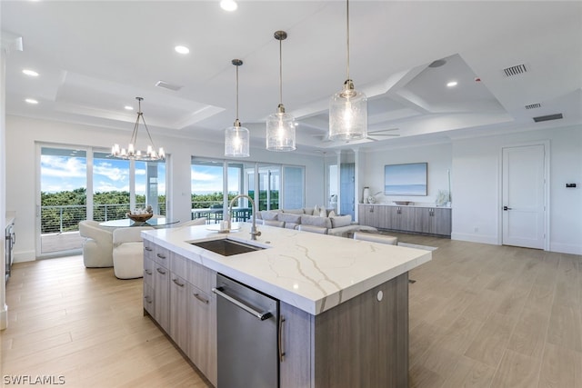 kitchen with dishwasher, a kitchen island with sink, light hardwood / wood-style floors, coffered ceiling, and sink