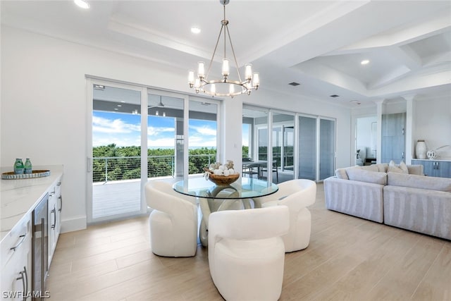 dining area with recessed lighting, visible vents, an inviting chandelier, light wood-type flooring, and coffered ceiling