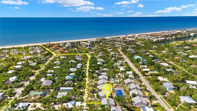 aerial view featuring a beach view and a water view