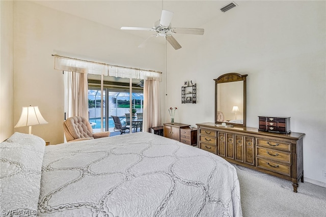 bedroom with access to exterior, a high ceiling, light carpet, and ceiling fan