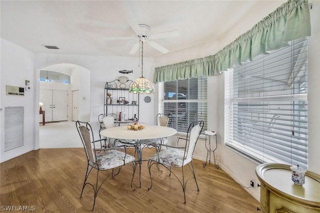 dining room featuring hardwood / wood-style floors and ceiling fan