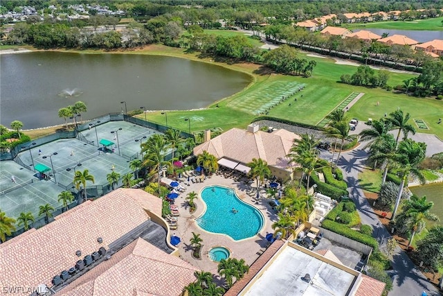 birds eye view of property featuring a water view