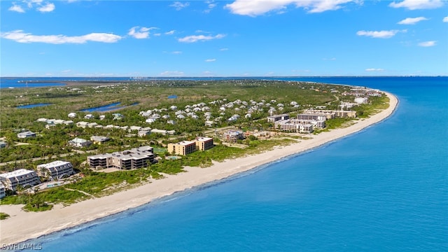 drone / aerial view with a view of the beach and a water view