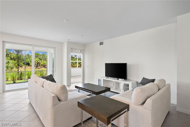 living room featuring light tile patterned floors