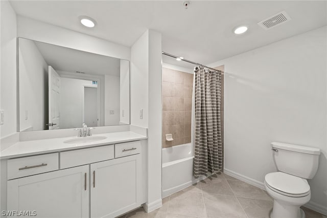 full bathroom featuring tile patterned flooring, vanity, shower / bath combination with curtain, and toilet