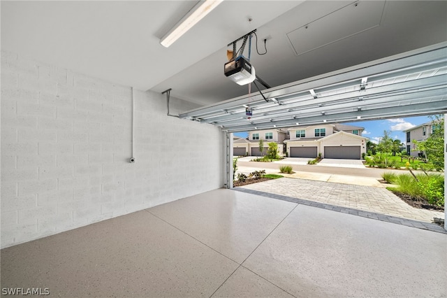 garage featuring a garage door opener