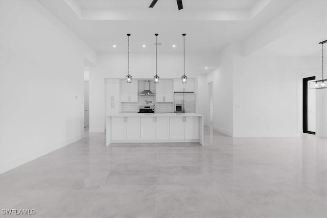 817 Jacaranda Pkwy E, Cape Coral, FL 33909 - kitchen with white cabinets, stainless steel fridge with ice dispenser, recessed lighting, open floor plan, and decorative backsplash