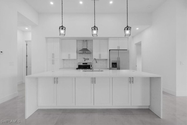 817 Jacaranda Pkwy E, Cape Coral, FL 33909 - kitchen featuring a sink, baseboards, stainless steel refrigerator with ice dispenser, and wall chimney exhaust hood