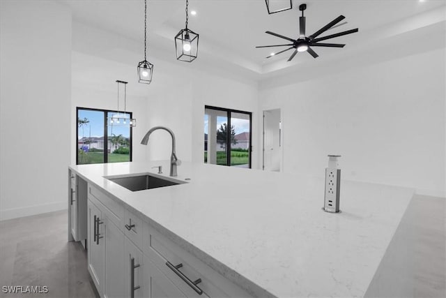 817 Jacaranda Pkwy E, Cape Coral, FL 33909 - kitchen featuring recessed lighting, decorative light fixtures, plenty of natural light, and a sink