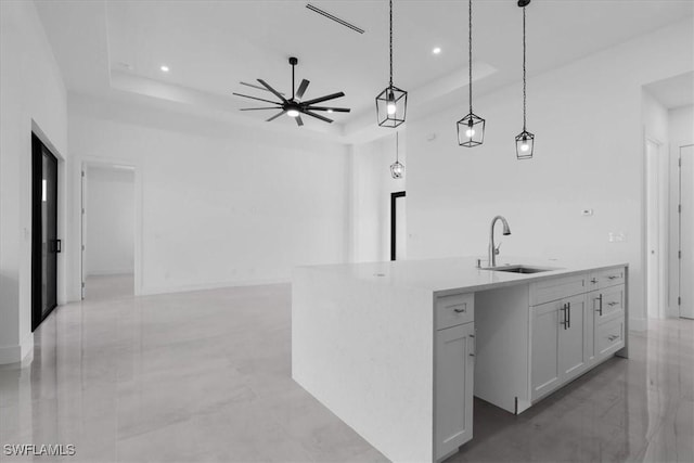 817 Jacaranda Pkwy E, Cape Coral, FL 33909 - bar with decorative light fixtures, a tray ceiling, ceiling fan, and a sink