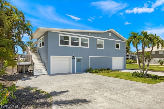 view of side of home with a garage