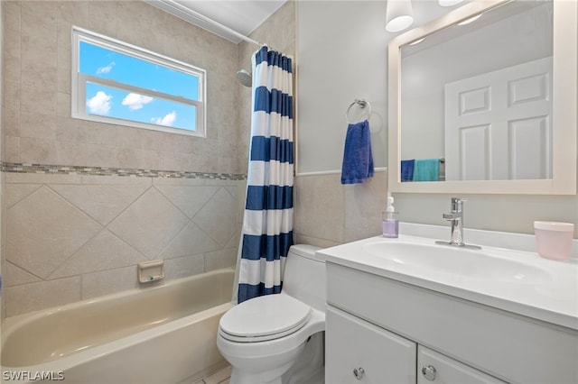 full bathroom with vanity, shower / bath combination with curtain, tile walls, and toilet