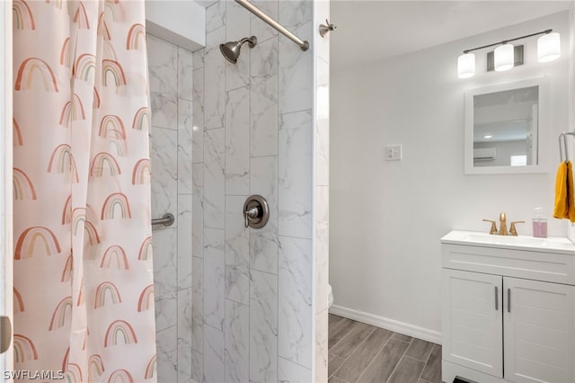 bathroom with a shower with shower curtain, vanity, and toilet