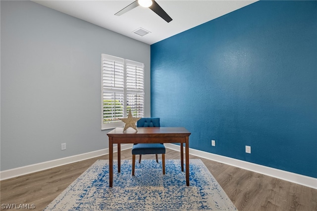 office with ceiling fan and wood-type flooring