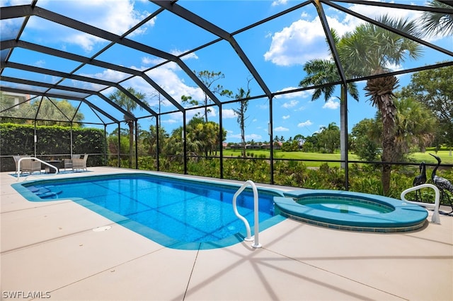 view of swimming pool with a lanai, a patio, and an in ground hot tub