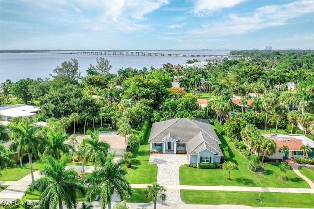 drone / aerial view with a water view