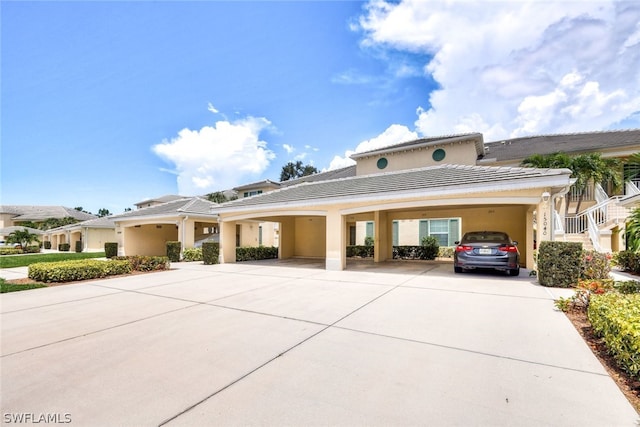 view of front of home with a carport