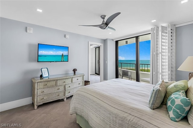 bedroom with floor to ceiling windows, access to outside, and ceiling fan