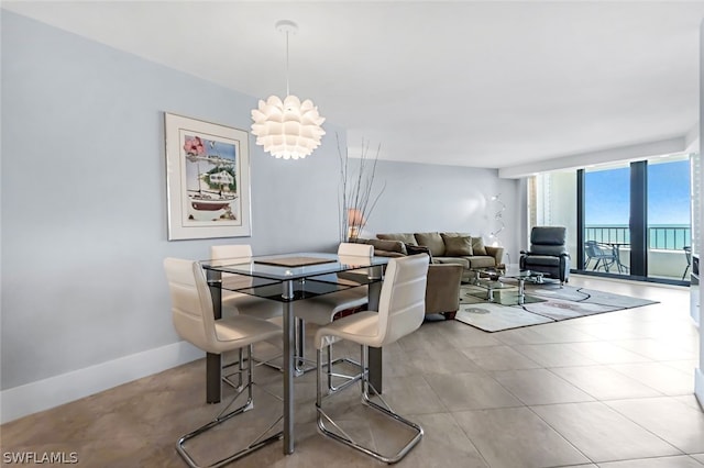 dining area with floor to ceiling windows