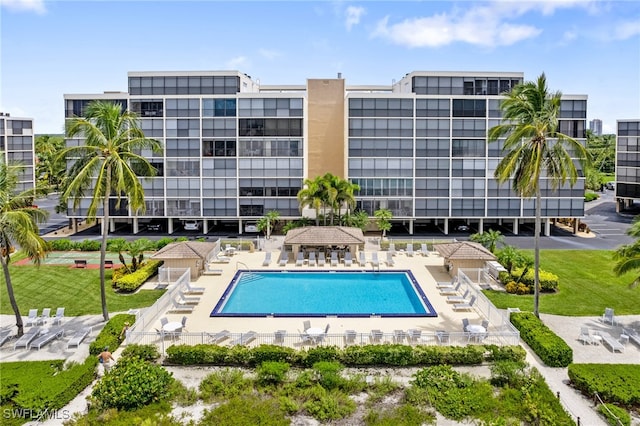 view of swimming pool with a patio