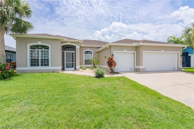 view of front facade featuring a garage and a front yard