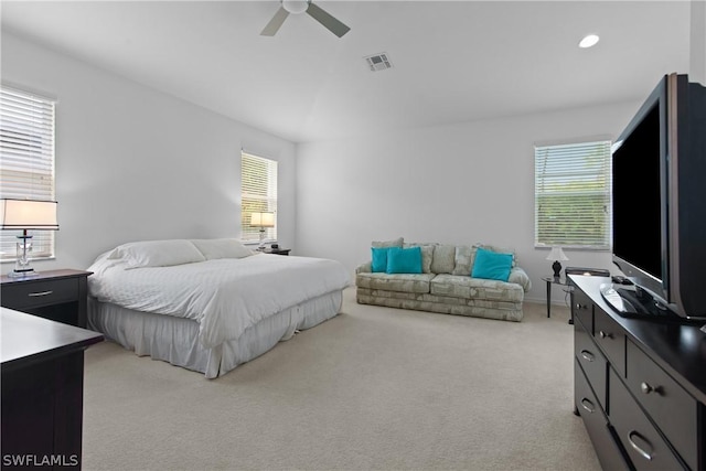 carpeted bedroom featuring ceiling fan