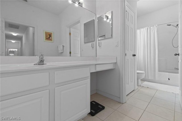 full bathroom featuring shower / tub combo with curtain, tile patterned floors, toilet, and vanity