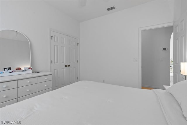 bedroom featuring a closet and ceiling fan