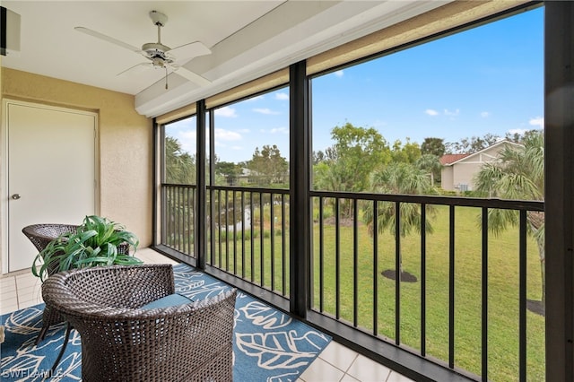 sunroom / solarium with ceiling fan