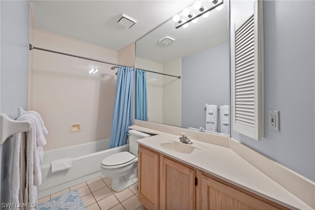 full bathroom with vanity, tile patterned floors, toilet, and shower / bath combo