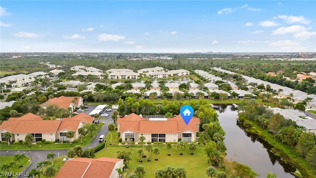 aerial view featuring a water view