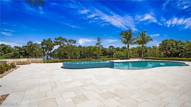 view of pool with a patio