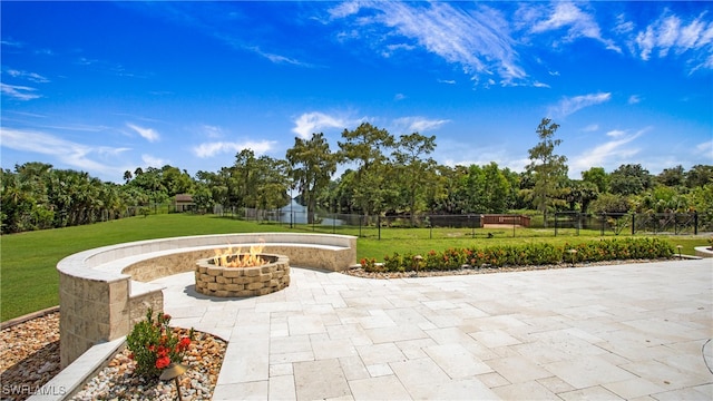 view of patio / terrace with a fire pit