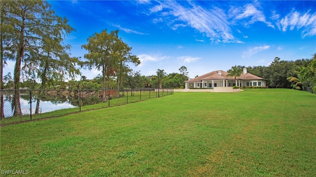 view of yard with a water view