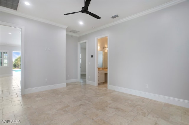 interior space featuring ceiling fan, ornamental molding, and ensuite bathroom