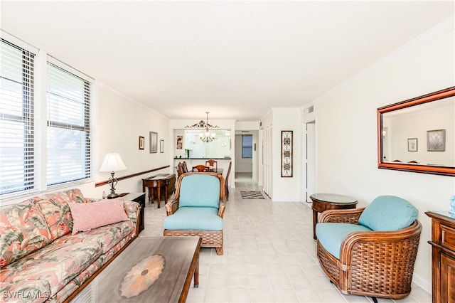 living room with a notable chandelier and crown molding