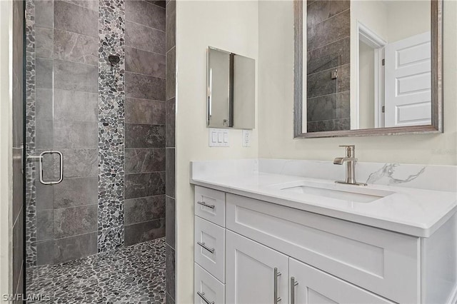 bathroom featuring vanity and walk in shower