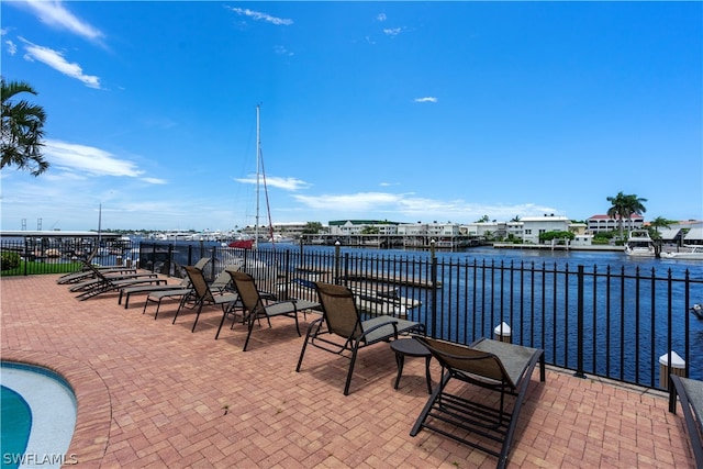 view of patio / terrace featuring a water view