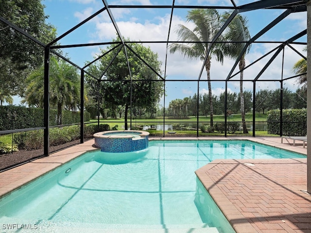 view of swimming pool featuring an in ground hot tub, glass enclosure, and a patio