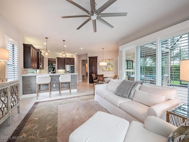 living room featuring ceiling fan