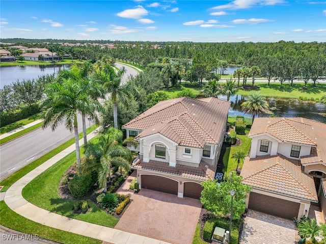 drone / aerial view with a water view