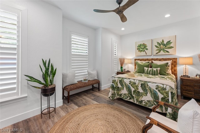 bedroom featuring ceiling fan and hardwood / wood-style floors