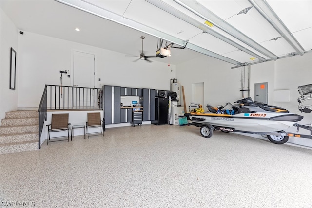 garage featuring a garage door opener, ceiling fan, and electric panel