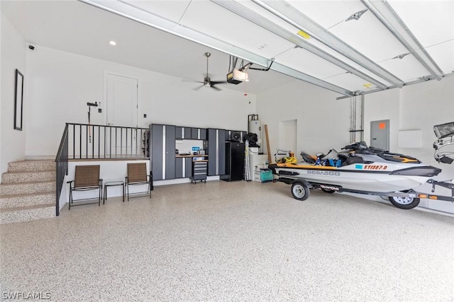 garage featuring electric panel and a garage door opener